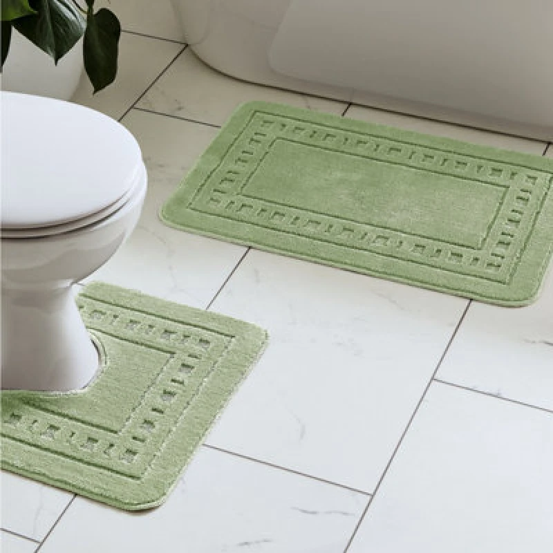 Image of Catherine Lansfield Catherine Lansfield 'Armoni' Bath Mat and Ped Set in Green Green One Size Unisex 5012601571716
