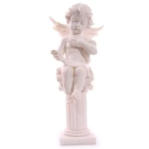 Image of Seated Cherub Figurine on Pillar Reading