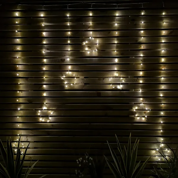 Image of 1.2m Battery Operated Christmas Star Curtain Lights with 140 Warm White LEDs