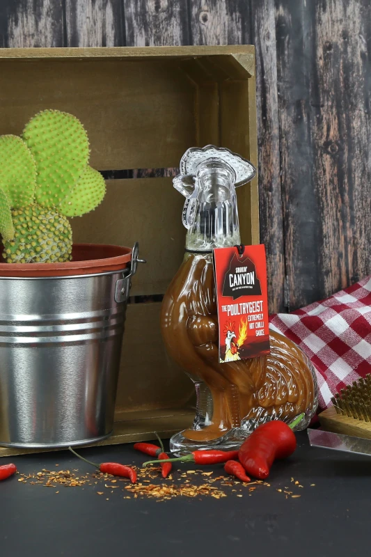 Image of Kimm and Miller (UK) Ltd Kimm and Miller (UK) Ltd The Poultrygeist Ghost & Red Jalapeno Hot Chilli Sauce Size: 180ml Red 180ml Unisex 5055475461486