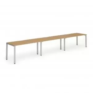 Image of Single Silver Frame Bench Desk 1400 Oak 3 Pod
