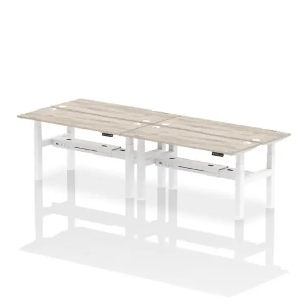 Image of Air Air Back-to-Back 1600 x 600mm Height Adjustable 4 Person Bench Desk Grey Oak Top with Cable Ports White Frame HASCP4P16600GRYW