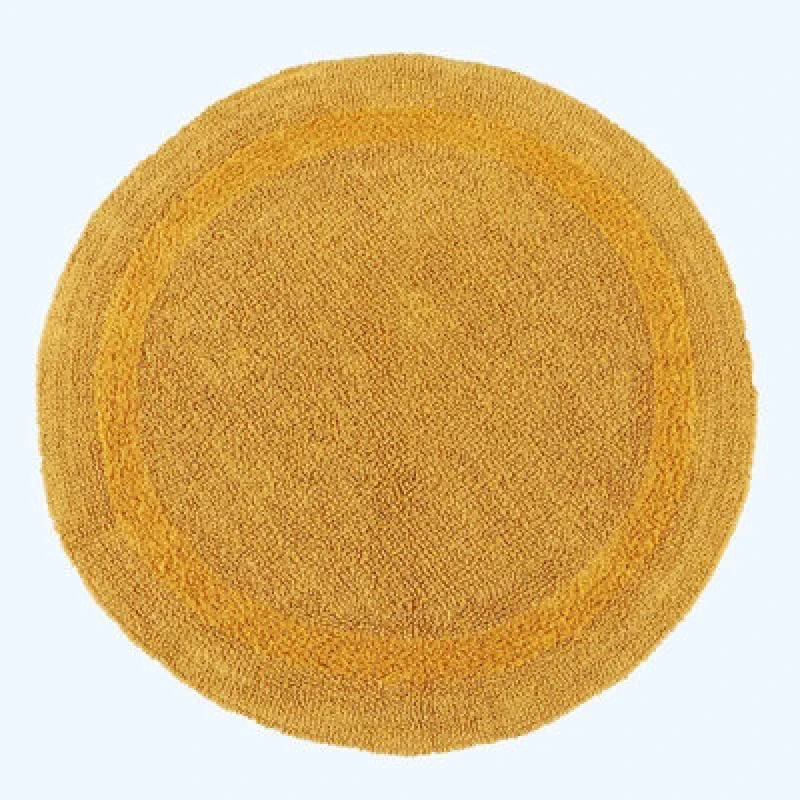 Image of Homescapes Luxury Reversible Round Bath Mat - Mustard Yellow