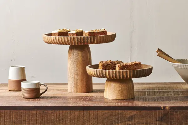 Image of nkuku Gavivi Mango Wood Stand Serveware Natural Small