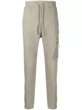 Image of C.P. COMPANY Logo patch tapered track pants Brown