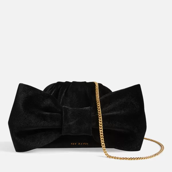 Image of Ted Baker Womens Niasie Velvet Bow Clutch Bag - Black
