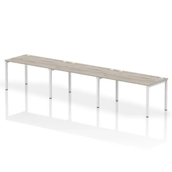 Image of Impulse Bench Single Row 3 Person 1400 White Frame Office Bench Desk Grey Oak