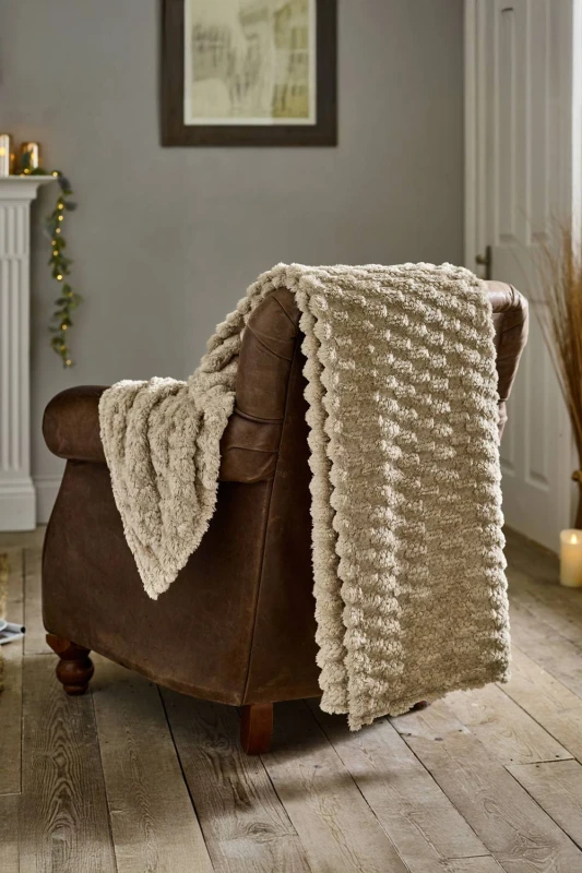 Image of Deyongs Deyongs Featherstone Soft Textured Warm Luxury Throw 130x170cm in Beige Size: 130cm x 170cm Beige 130cm x 170cm Unisex 5054990146311