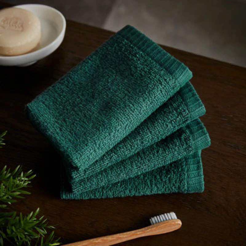 Image of Catherine Lansfield Catherine Lansfield 'Quick Dry' Face Cloth 4 Pack in Emerald Size: Face Towel Emerald Face Towel Unisex 5057681106151