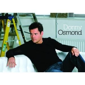 Image of Donny Osmond - On Couch Postcard