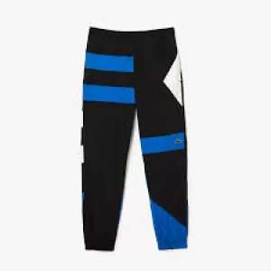 Image of Mens Lacoste Patchwork Water-Repellent Trackpants Size 3 - S Black / Blue / White