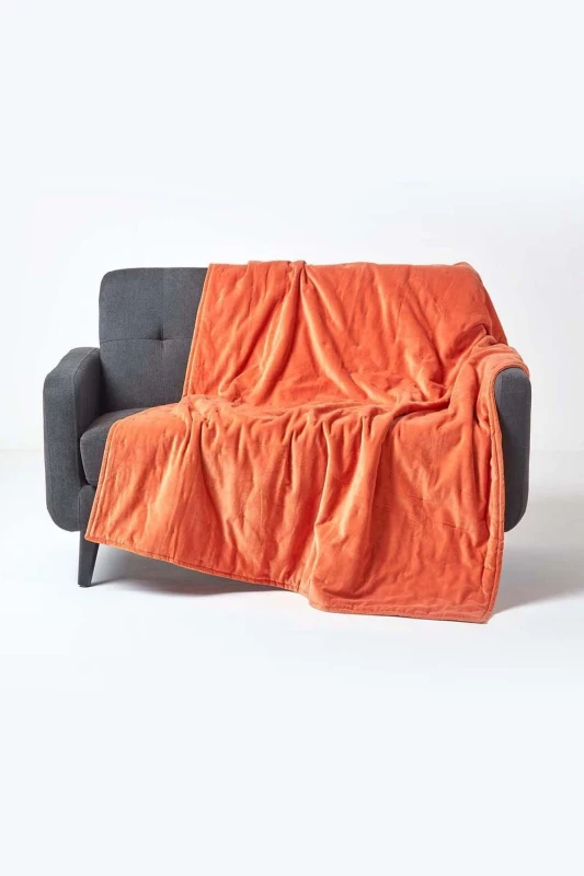 Image of HOMESCAPES Burnt Orange Velvet Quilted Throw, 150 x 200cm - Orange - Homescapes SF1955B