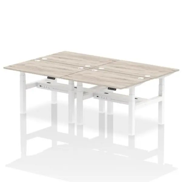 Image of Air Air Back-to-Back 1200 x 800mm Height Adjustable 4 Person Bench Desk Grey Oak Top with Cable Ports White Frame HASCP4P12800GRYW