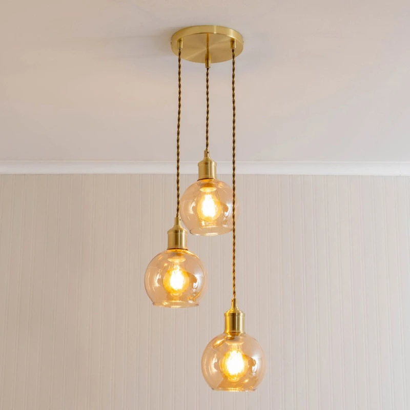 Image of ValueLights ValueLights Bellamy Amber Glass Globe 3 Drop Cluster Gold Ceiling Pendant Light Amber One Size Unisex 5059406062445