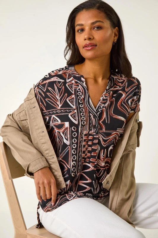 Image of Roman Womens Textured Ikat Print Stretch Top in Orange Size: 18 Orange Female 18