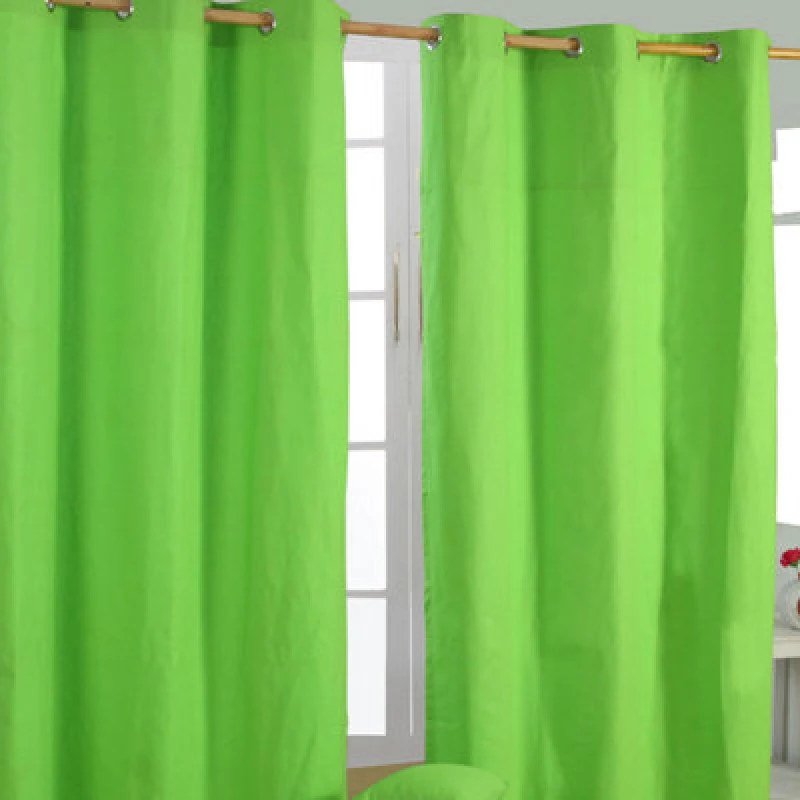 Image of Homescapes Plain Cotton Ready Made Eyelet Curtain Pair Green