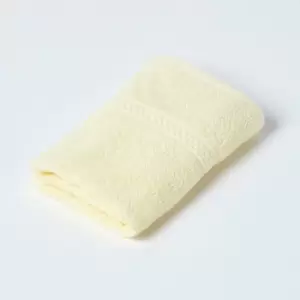 Image of HOMESCAPES Turkish Cotton Face Cloth, Yellow - Yellow