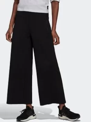 Image of adidas Sportswear Mission Victory Wide Tracksuit Bottoms, Black, Size S, Women