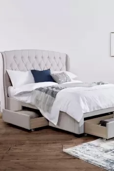 Image of Elise Stone Winged Upholstered Drawer Storage Bed Frame