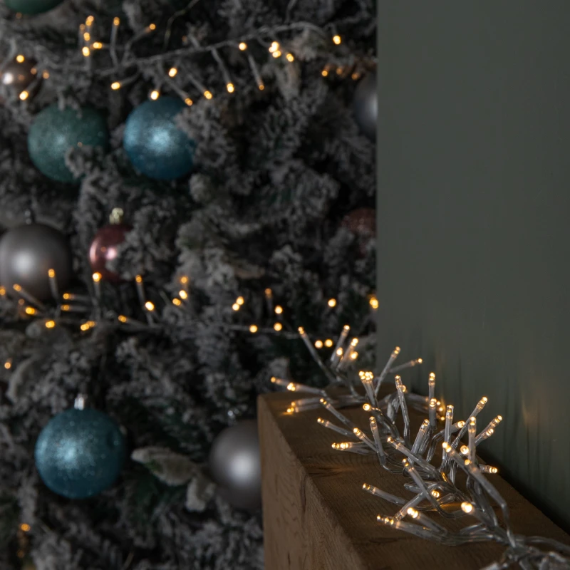 Image of 9.3m 720 LED Christmas Cluster String Lights with Timer in Warm White on Clear Cable