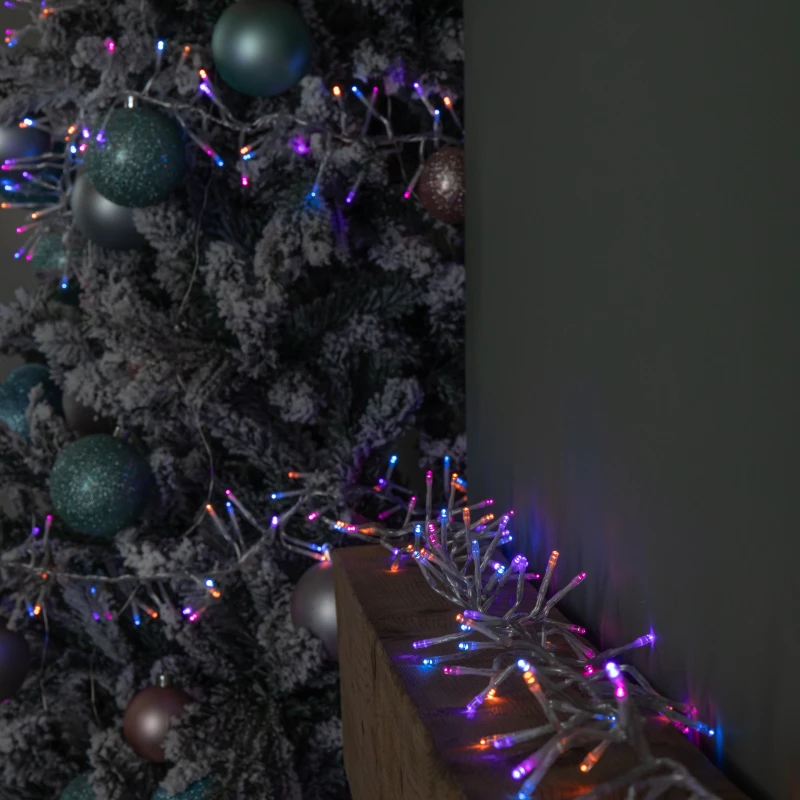 Image of 9.3m 720 LED Christmas Cluster String Lights with Timer in Rainbow on Clear Cable