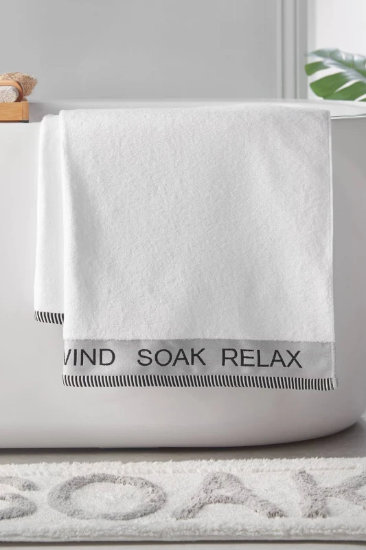 Image of Catherine Lansfield 'Relax & Unwind' Towel in White White Unisex