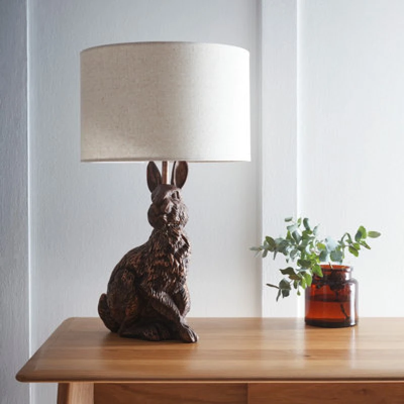 Image of K Living Bunny Rabbit Animal Table Lamp In An Antique Copper Resin Finish With A Natural Linen Lampshade