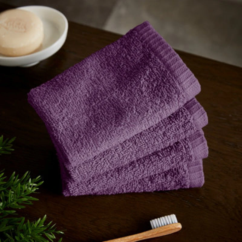 Image of Catherine Lansfield Catherine Lansfield 'Quick Dry' Face Cloth 4 Pack in Plum Size: Face Towel Plum Face Towel Unisex 5057681152394