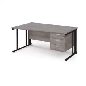Image of Maestro 25 left hand wave desk 1600mm wide with 3 drawer pedestal - Black cable managed leg frame and grey oak top