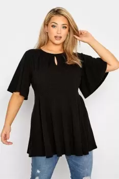 Image of Ribbed Keyhole Peplum Top