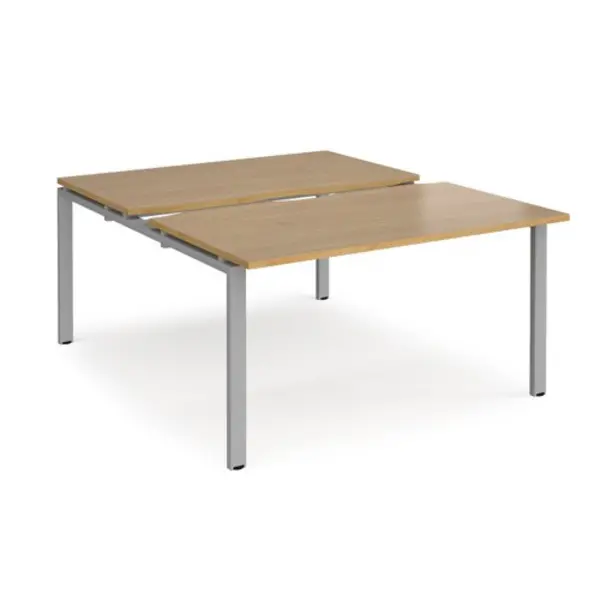 Image of Adapt Bench Desk 2 Person Rectangular Desks 1400mm With Sliding Tops Oak Tops With Silver Frames 1600mm Depth Adapt Oak STE1416-S-O