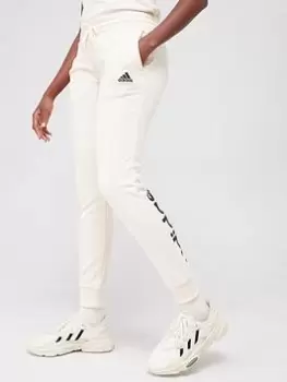 Image of Adidas Linear French Terry Cuffed Pants - Cream