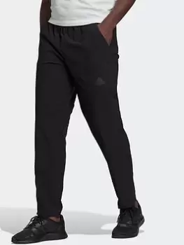 Image of adidas Essentials Hero To Halo Woven Tracksuit Bottoms, Blue, Size S, Men