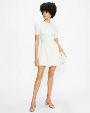 Image of Puff Sleeve Dress With Engineered Skirt