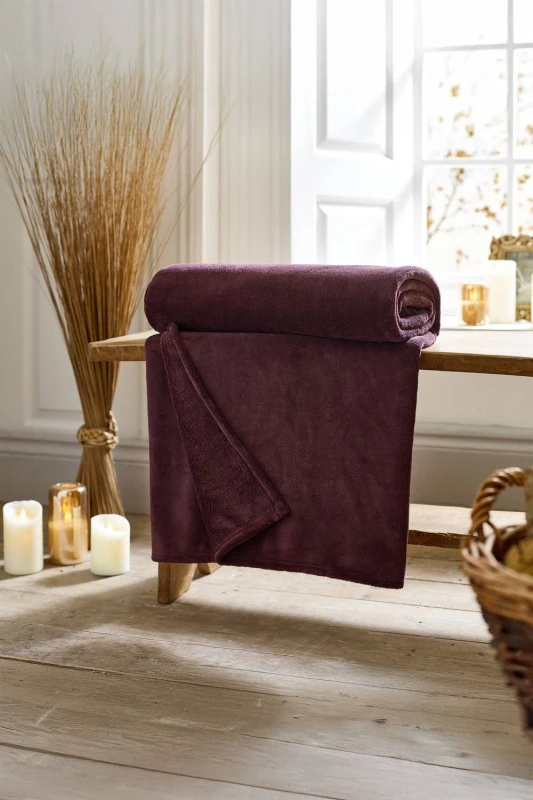 Image of Deyongs Deyongs Snuggle Touch Super Soft Solid Colour Fleece Throw in Wine Size: 140cm x 180cm Wine 140cm x 180cm Unisex 5054990142726