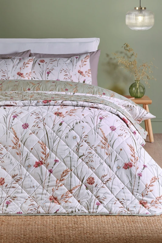 Image of Catherine Lansfield Catherine Lansfield 'Brushed Grasmere Floral' Cotton Reversible Quilted Bedspread in Green Green One Size Unisex 5057681189628