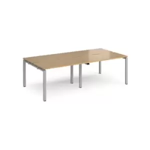 Image of Bench Desk 4 Person Rectangular Desks 2400mm Oak Tops With Silver Frames 1200mm Depth Adapt