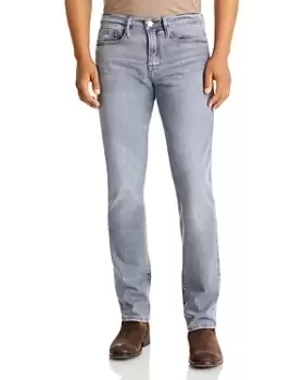 Image of Frame LHomme Degradable Slim Fit Jeans in Rainfall