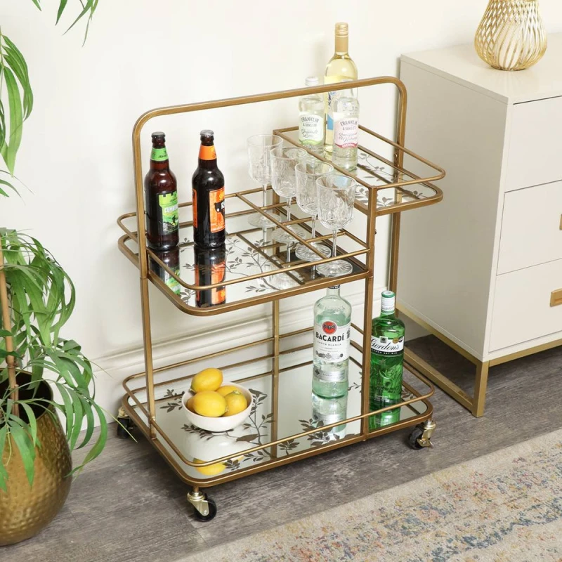 Image of Melody Maison Gold Vintage Printed Glass 3 Tier Drinks Trolley With Wheels Gold