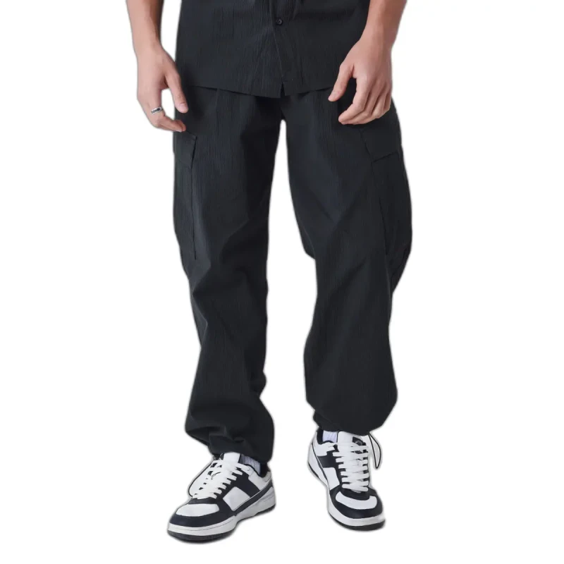 Image of Project X Paris Wrinkled effect trousers with pockets Project X Paris Noir Male M