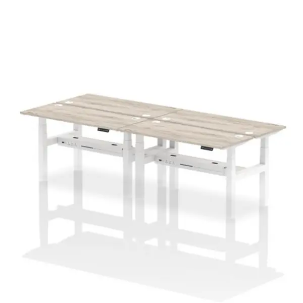 Image of Air Air Back-to-Back 1400 x 600mm Height Adjustable 4 Person Bench Desk Grey Oak Top with Cable Ports White Frame HASCP4P14600GRYW