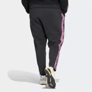 Image of adidas Tiro Winterized Tracksuit Bottoms (Plus Size) Wome - Black / Pulse Lilac