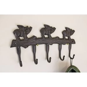 Image of Rustic Cast Iron Wall Hooks, Flying Pigs