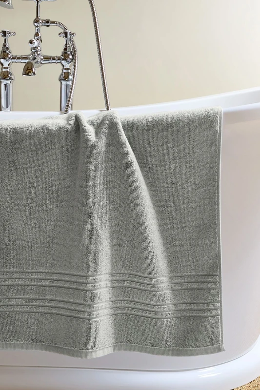 Image of Christy CHRISTY 'Serene' Pastel 100% Combed Cotton Bath Mat in Light Grey Light Grey One Size Unisex 5057241204204