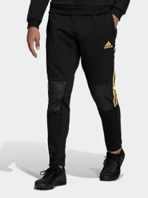 Image of adidas Tiro Winterized Tracksuit Bottoms, Black/Yellow, Size S, Men