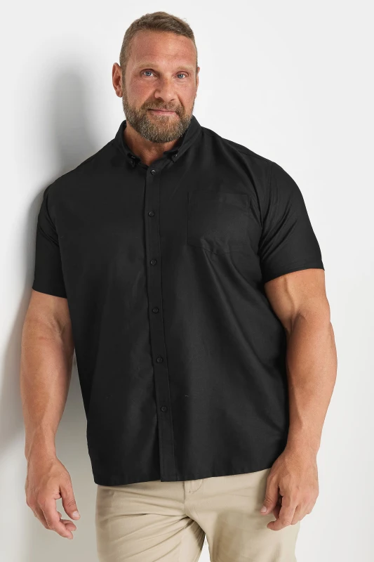 Image of BadRhino BadRhino Men Short Sleeve Oxford Cotton Shirt in Black Size: 4X-Large Black 4XL Male 5063111261109