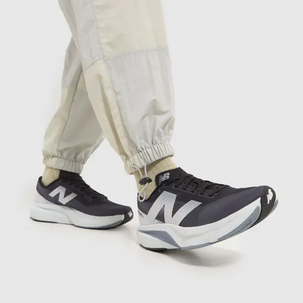 Image of New Balance fuelcell rebel v4 trainers in navy & white Navy & White UK 10 (EU 44½)