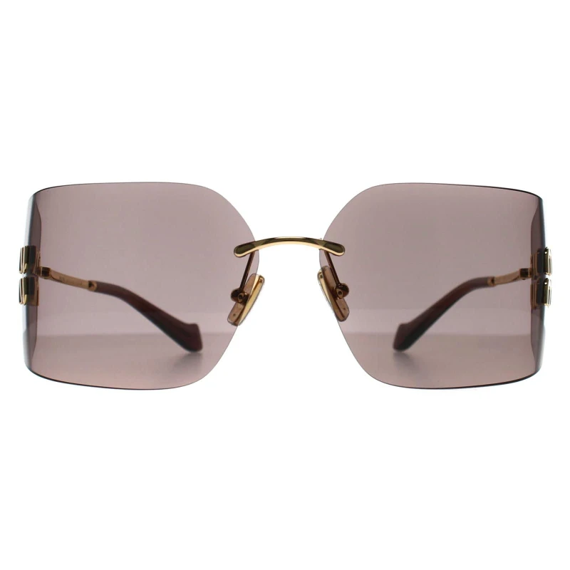 Image of Miu Miu Womens Rimless Gold Light Purple Brown MU54YS Gold Female One Size