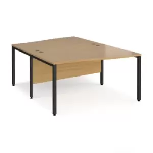 Image of Office Desk 2 Person Wave Desk 1400mm Oak Tops With Black Frames Maestro 25
