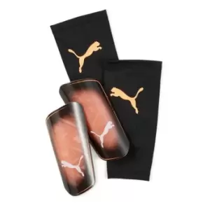 Image of Puma Ultra Light Sleeve Shin Guards Mens - Orange